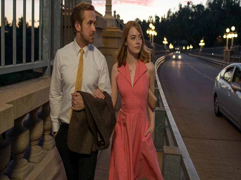 Ryan Gosling and Emma Stone stroll the Colorado Street Bridge in "La La Land"