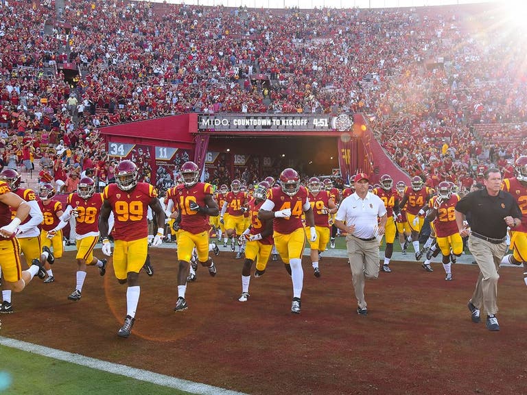 USC Trojans running onto the field at LA Coliseum