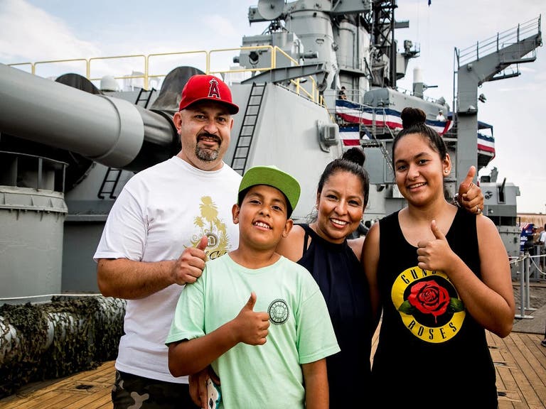 A family tours the Battleship IOWA in San Pedro