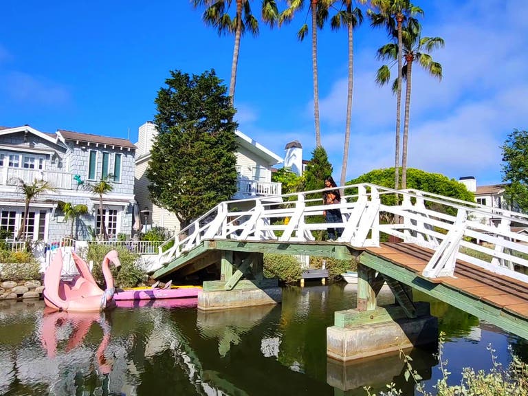 Bridge and flamingo boat at the Venice Canals